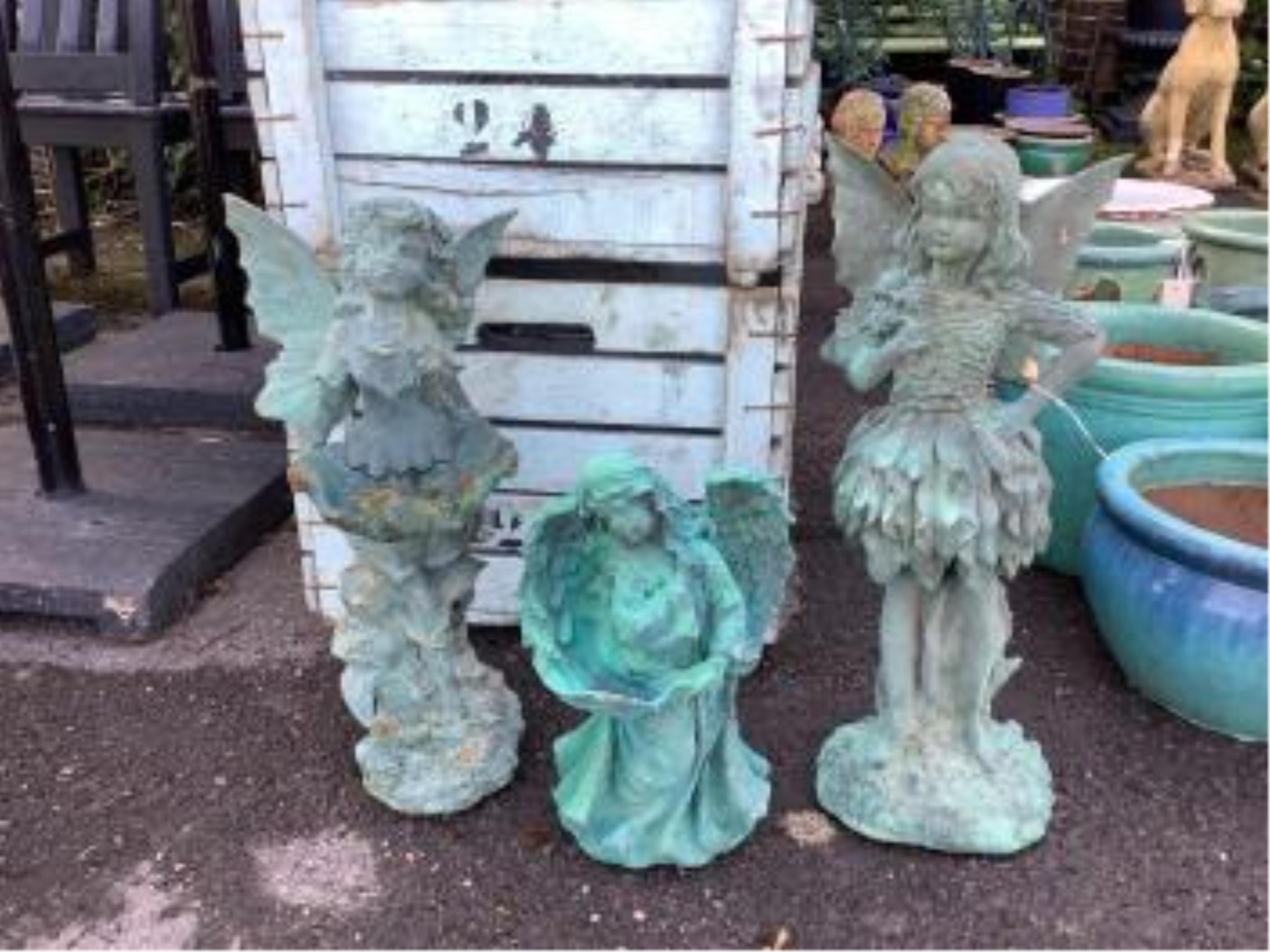 A collection of assorted garden ornaments including reconstituted busts, figures and animals, two Buddhas, a set of three cast iron Beatrix Potter figures and four assorted lanterns, largest height 58cm (19). Condition -